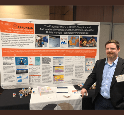 Joshua B. Barbour with his poster at the Coalition for National Science Funding’s 25th Annual Exhibition and Reception