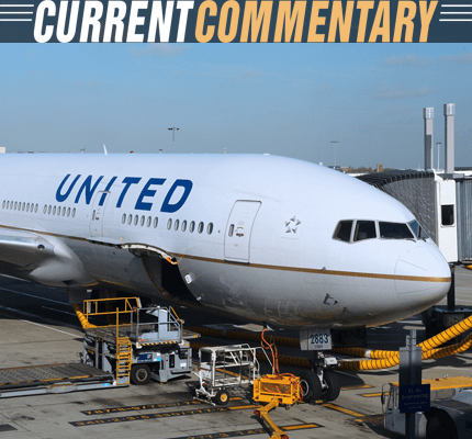 United Airlines plane at an airport gate