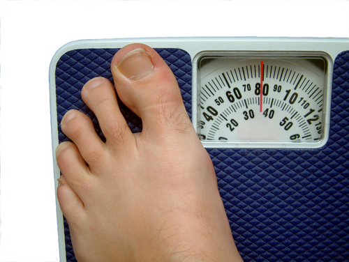 Photo - Human Foot on Bathroom Scale