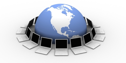 World-Surrounded-By-Laptop-Computers