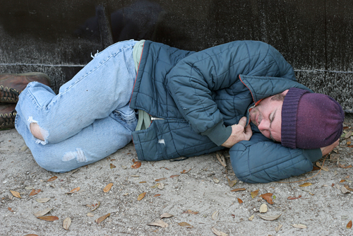 photo - homeless person sleep on street