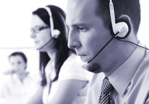 photo - man with head phones providing customer service - National Communication Association photo - man with head phones providing customer service