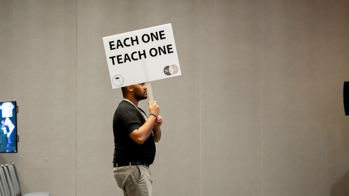 nca each one teach one picket sign